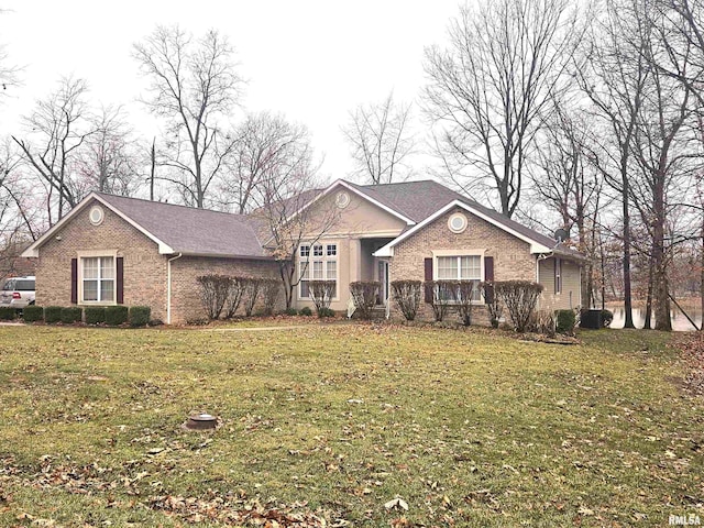 ranch-style house featuring a front yard