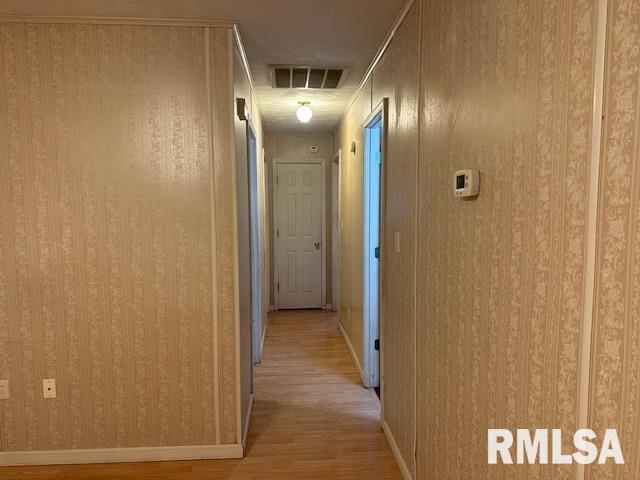 hallway featuring light hardwood / wood-style flooring