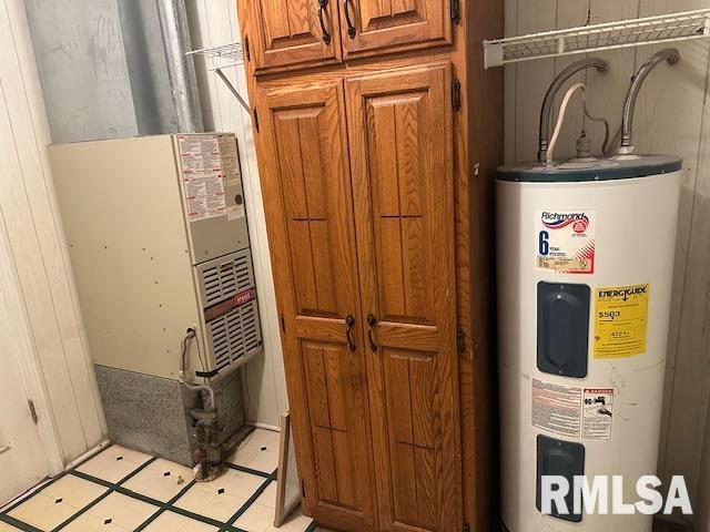 utility room with water heater