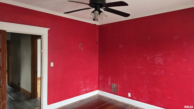 unfurnished room with dark hardwood / wood-style flooring, crown molding, and ceiling fan