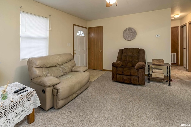 living room featuring light colored carpet