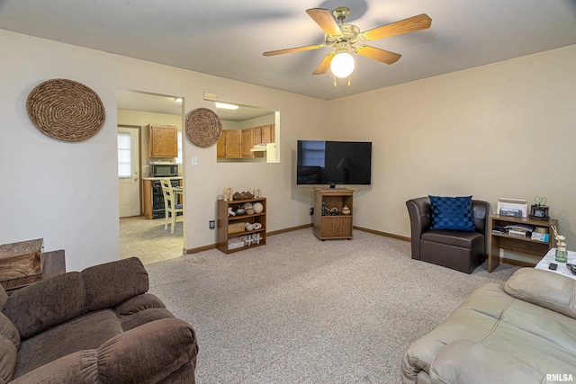 living room featuring light colored carpet, beverage cooler, and ceiling fan