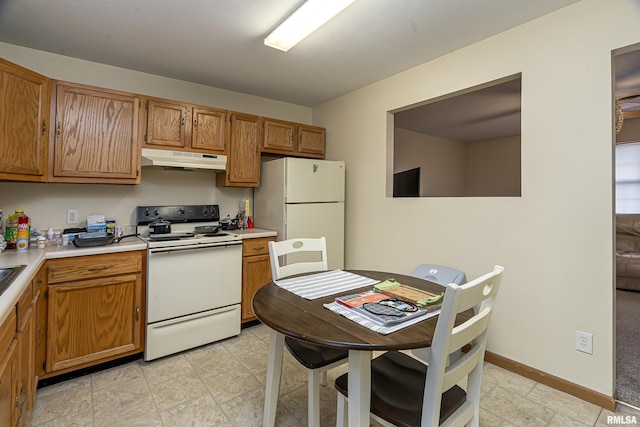 kitchen featuring white appliances