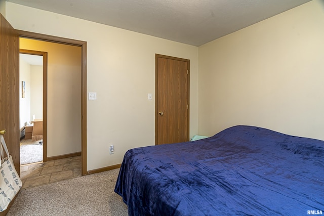 bedroom with light colored carpet