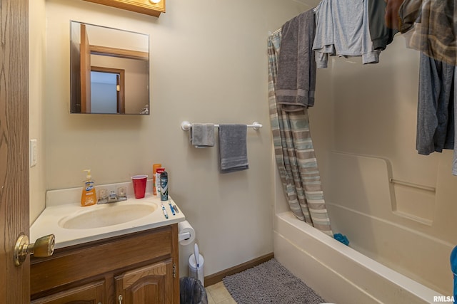 bathroom with vanity, shower / tub combo, and tile patterned flooring