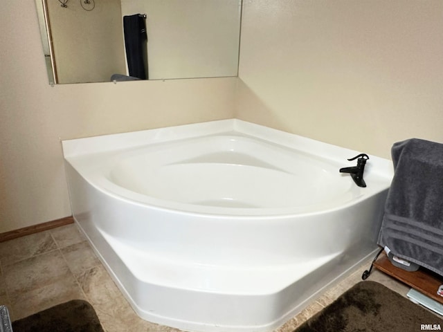 bathroom featuring a tub to relax in