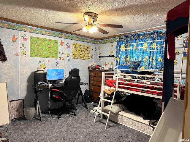 carpeted bedroom featuring ceiling fan, ornamental molding, and a textured ceiling