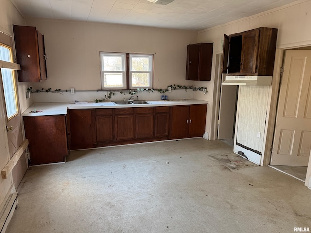 kitchen featuring a baseboard radiator and sink