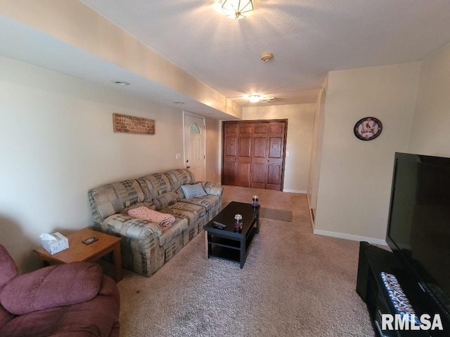 living room featuring light carpet