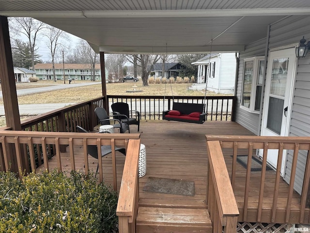 wooden terrace with covered porch