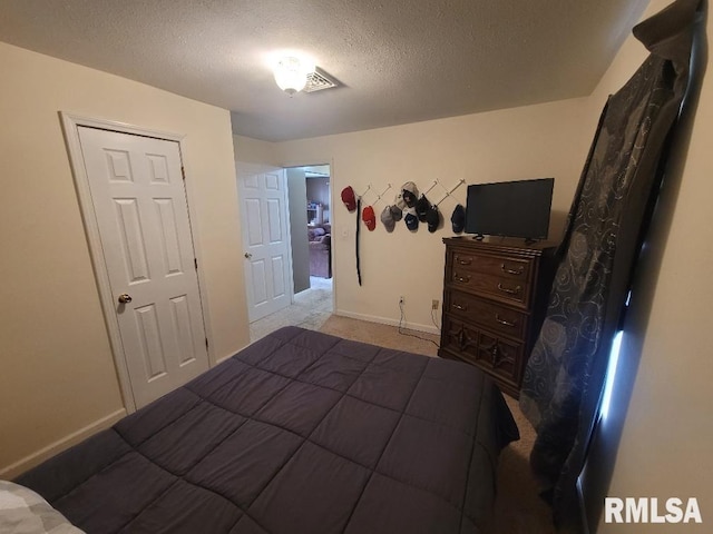 bedroom with a textured ceiling