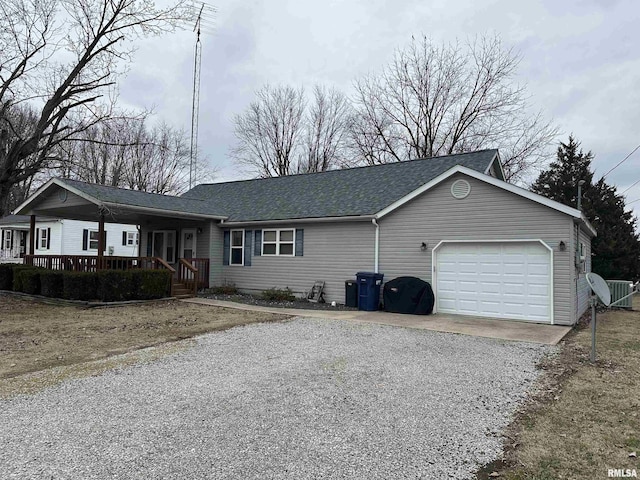 single story home with a garage