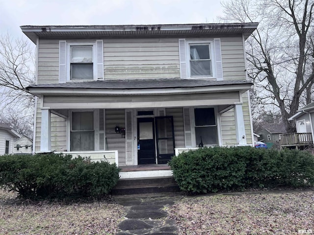 front of property featuring covered porch