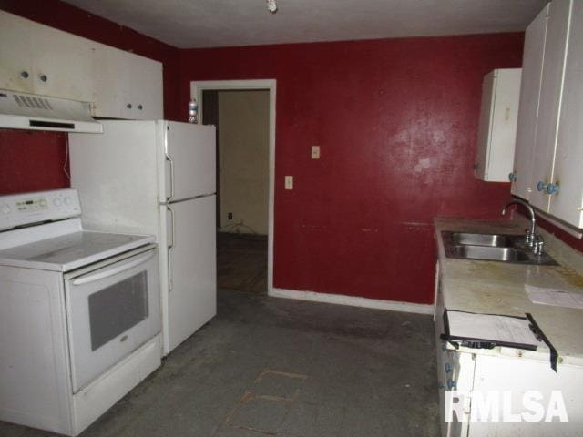 kitchen featuring white cabinetry, sink, and white appliances