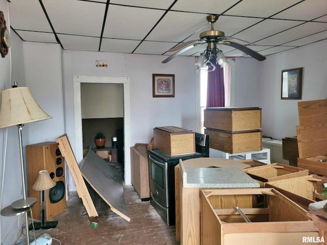 kitchen with a paneled ceiling and ceiling fan