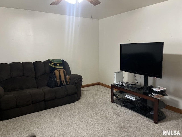 living room with carpet flooring and ceiling fan