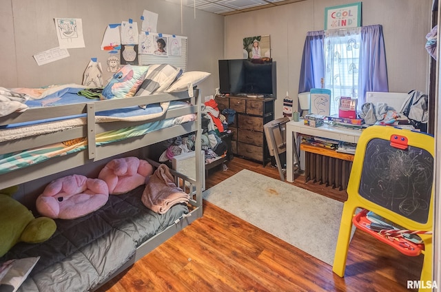 bedroom featuring wood-type flooring