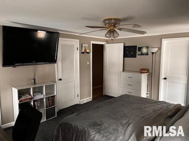 bedroom with a closet and ceiling fan