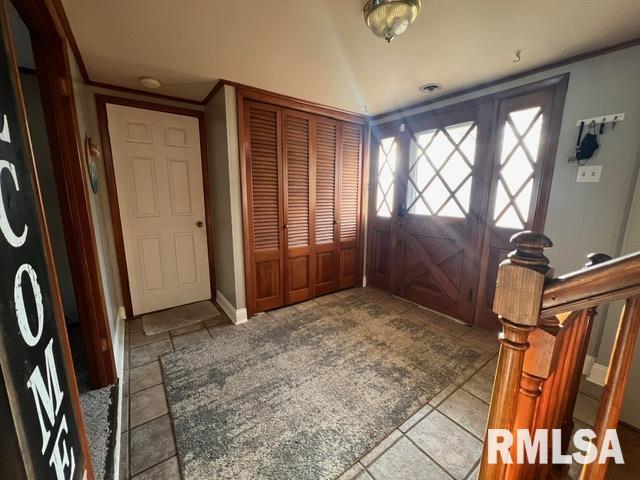 view of tiled foyer