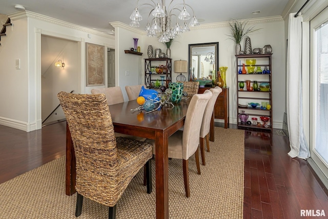 dining space with crown molding, dark hardwood / wood-style floors, and an inviting chandelier