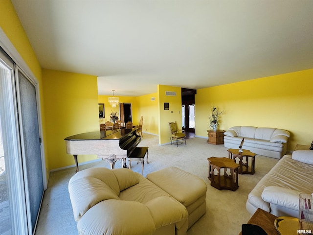living room with light carpet and baseboards