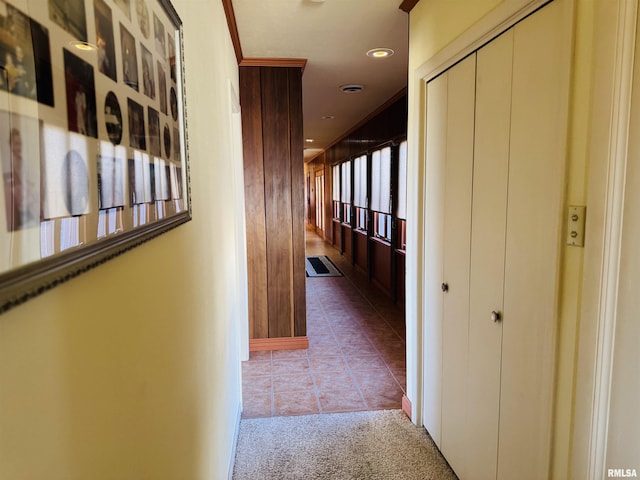 corridor featuring recessed lighting, light colored carpet, and light tile patterned flooring