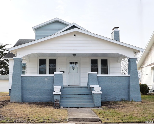 bungalow-style house featuring covered porch