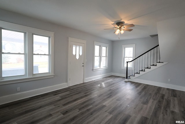 foyer featuring ceiling fan and dark hardwood / wood-style flooring