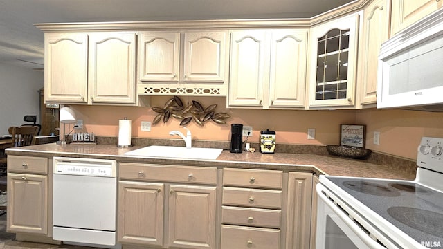 kitchen with sink and white appliances