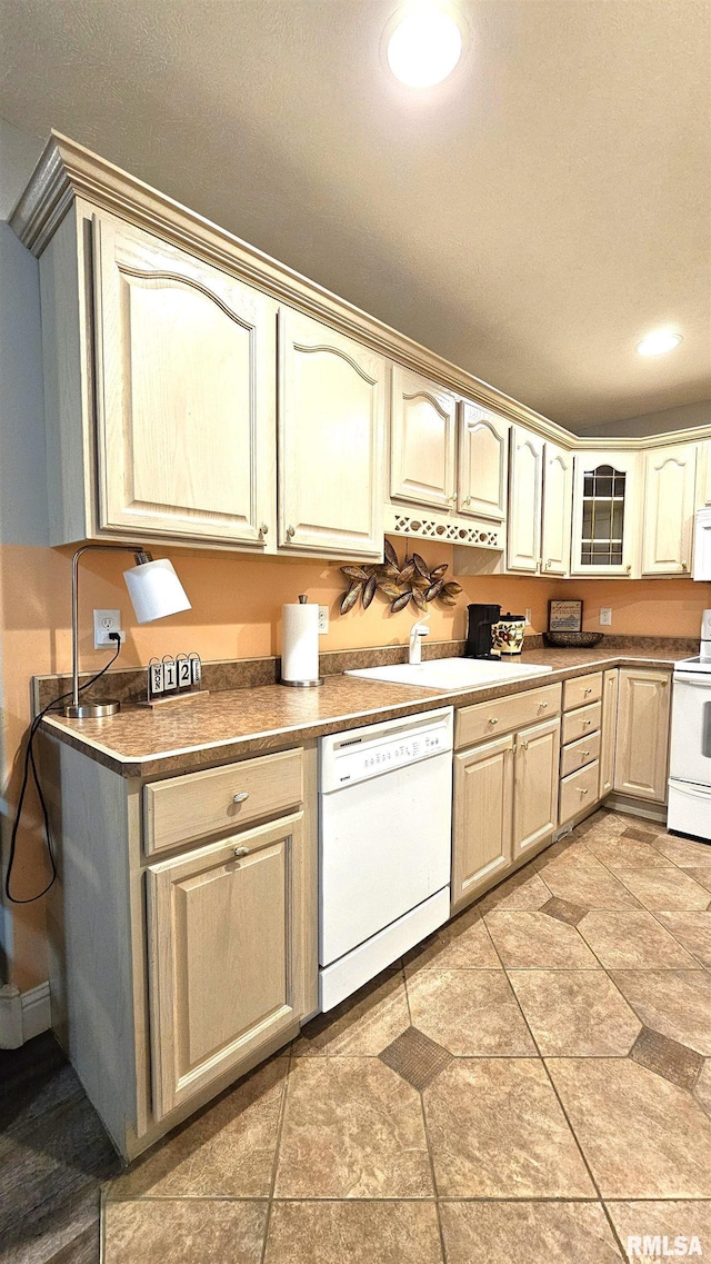 kitchen with sink and white appliances