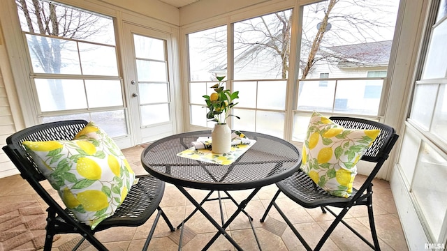 sunroom featuring a healthy amount of sunlight