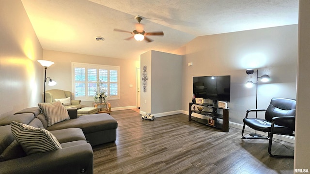 living room with ceiling fan, lofted ceiling, and dark hardwood / wood-style flooring