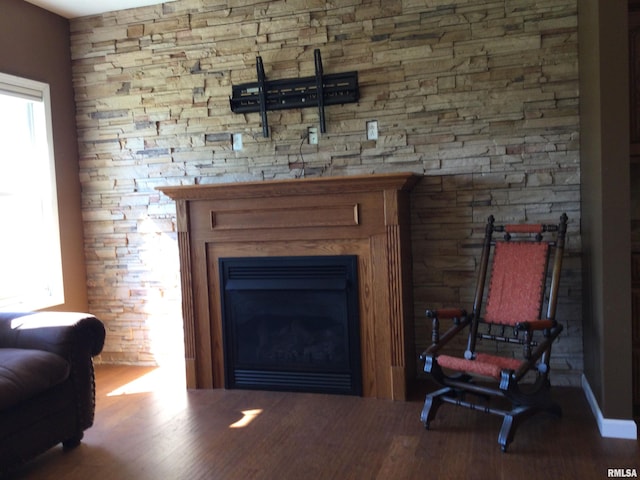 sitting room featuring wood-type flooring