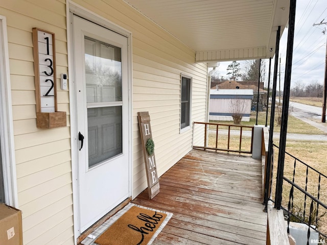 wooden terrace with covered porch