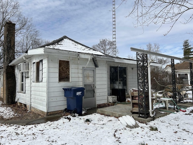 view of snow covered property