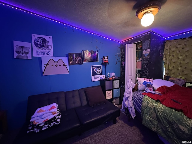 carpeted bedroom with a textured ceiling