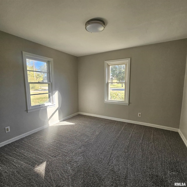 unfurnished room with carpet floors