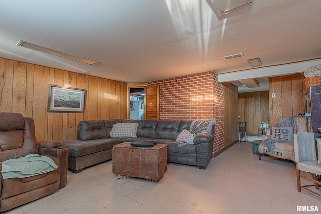 living room with wooden walls