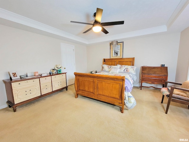 carpeted bedroom with ceiling fan and crown molding