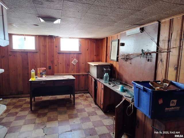 interior space featuring wooden walls