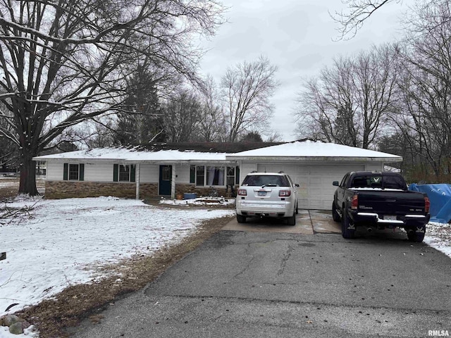 single story home featuring a garage