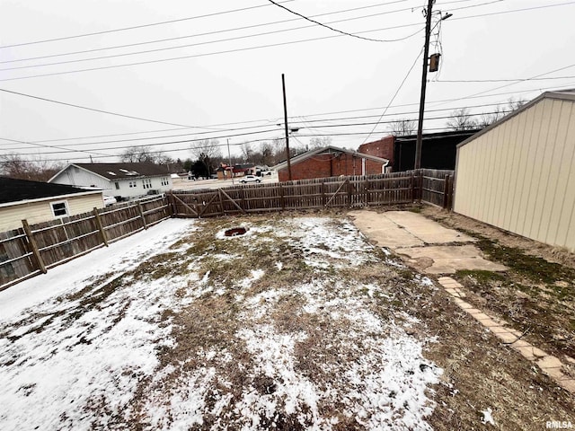 view of yard covered in snow