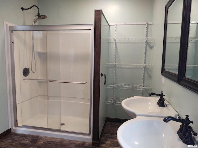 85 Bethlehem Church Ln, Vienna, IL 62995 - bathroom featuring a stall shower and two sinks