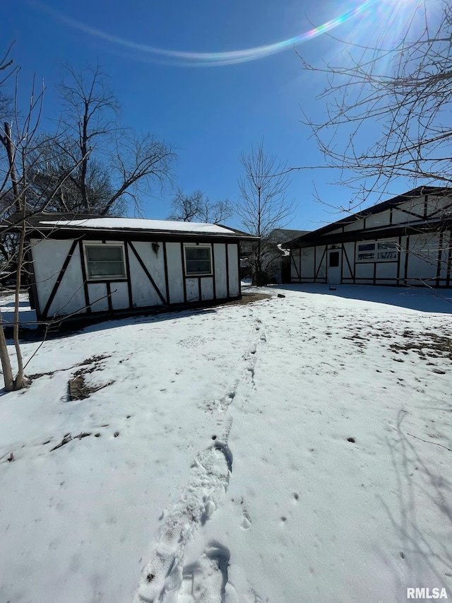 exterior space with stucco siding