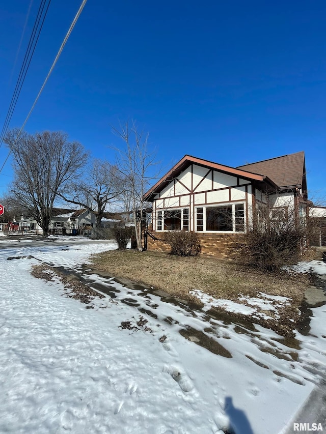 view of snow covered property