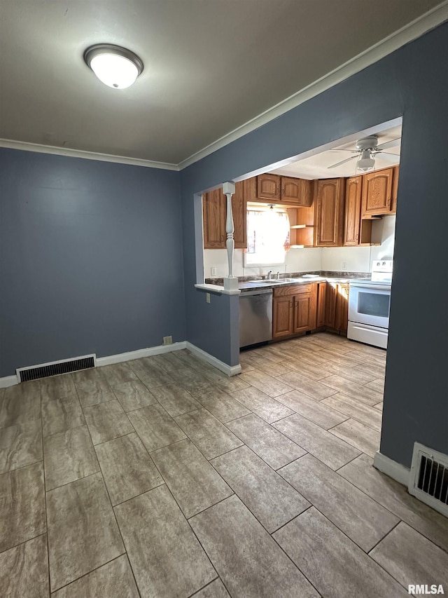 kitchen featuring brown cabinets, light countertops, white electric range, visible vents, and dishwasher