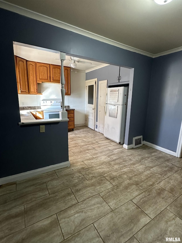 kitchen featuring white appliances, visible vents, a ceiling fan, brown cabinets, and crown molding