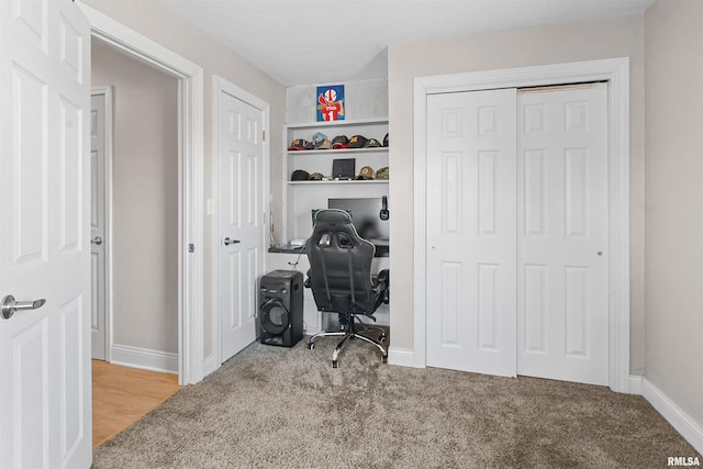 office with carpet and baseboards