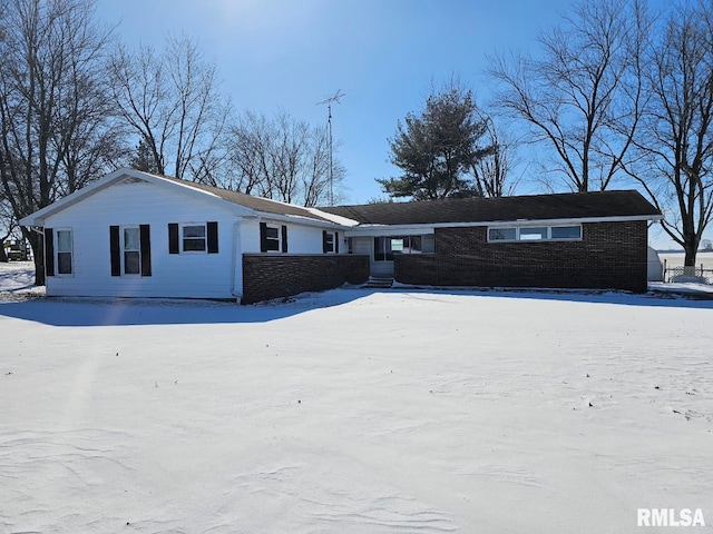 ranch-style home with brick siding