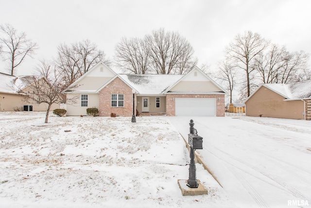 ranch-style house with brick siding and an attached garage